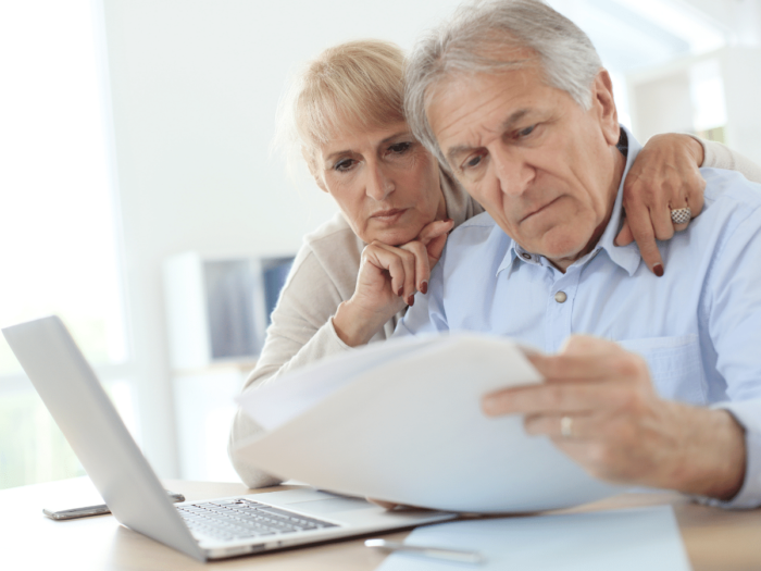 Couple Using Computer Taxes